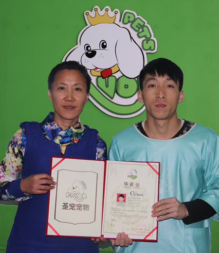 圣寵學員韓建生與金春梅老師合影